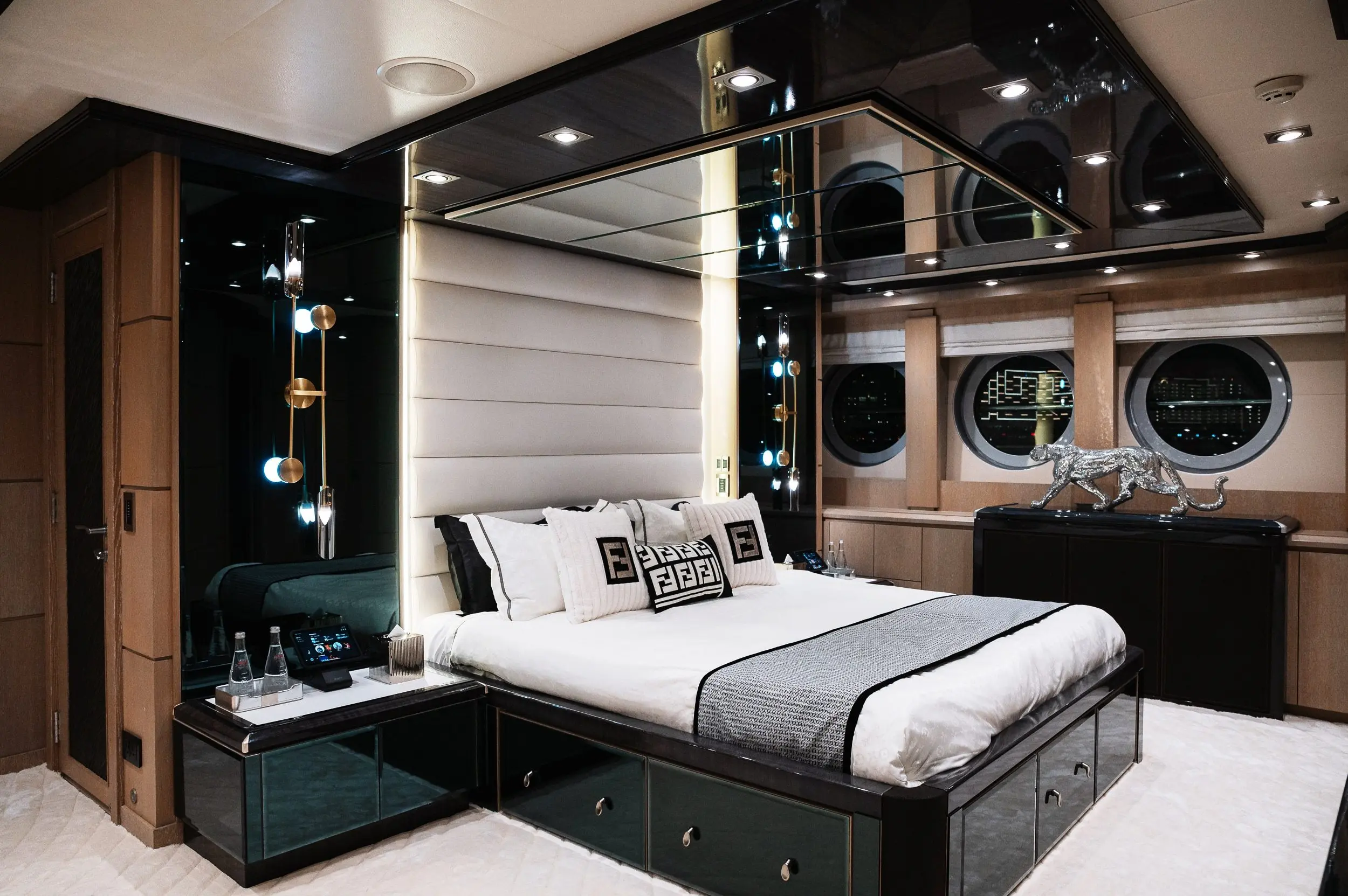 Royalty 136 yacht VIP cabin bedroom with modern lighting and luxury furnishings