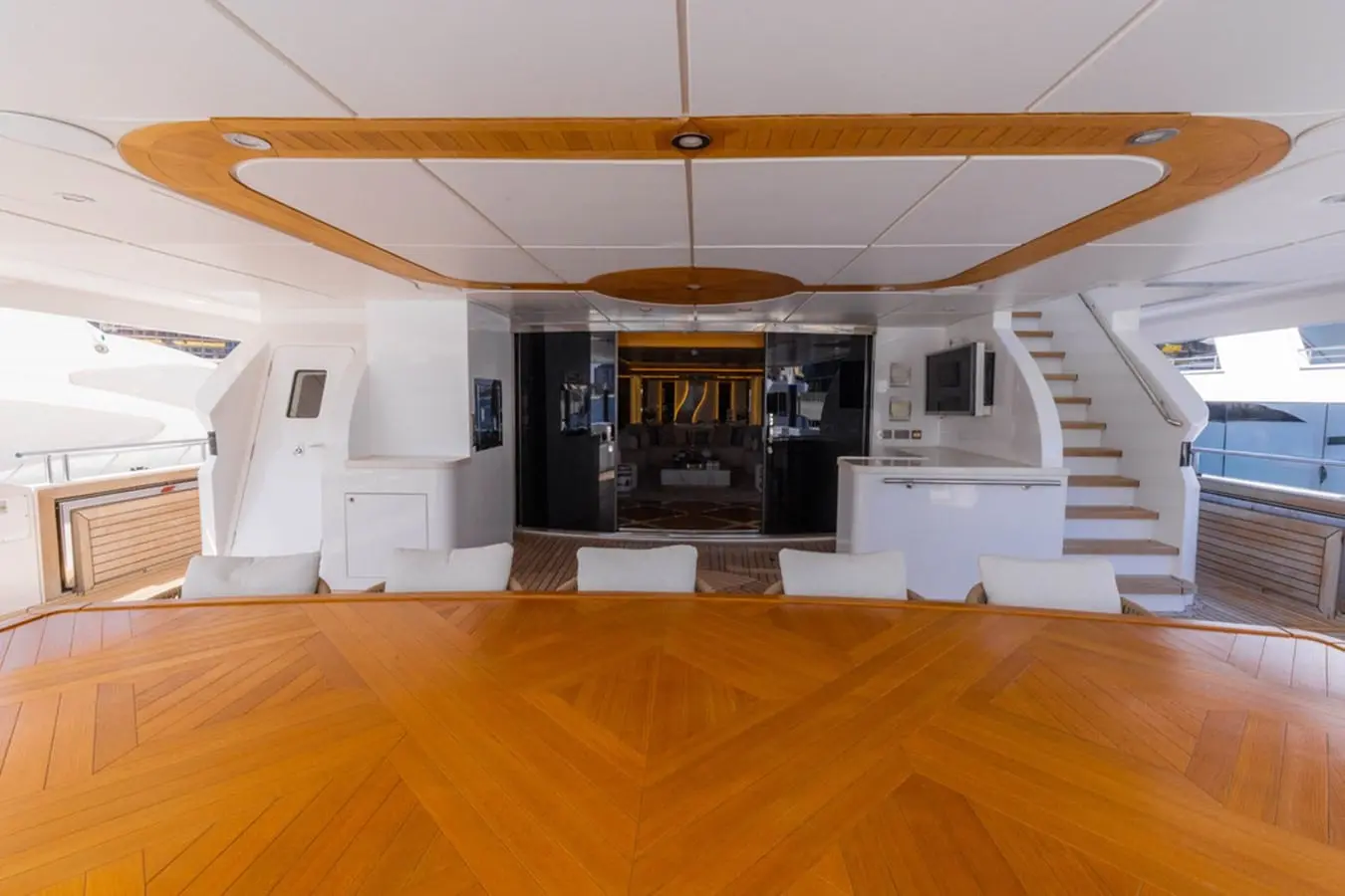 Majesty 155 upper aft deck dining area looking forward, broker photo