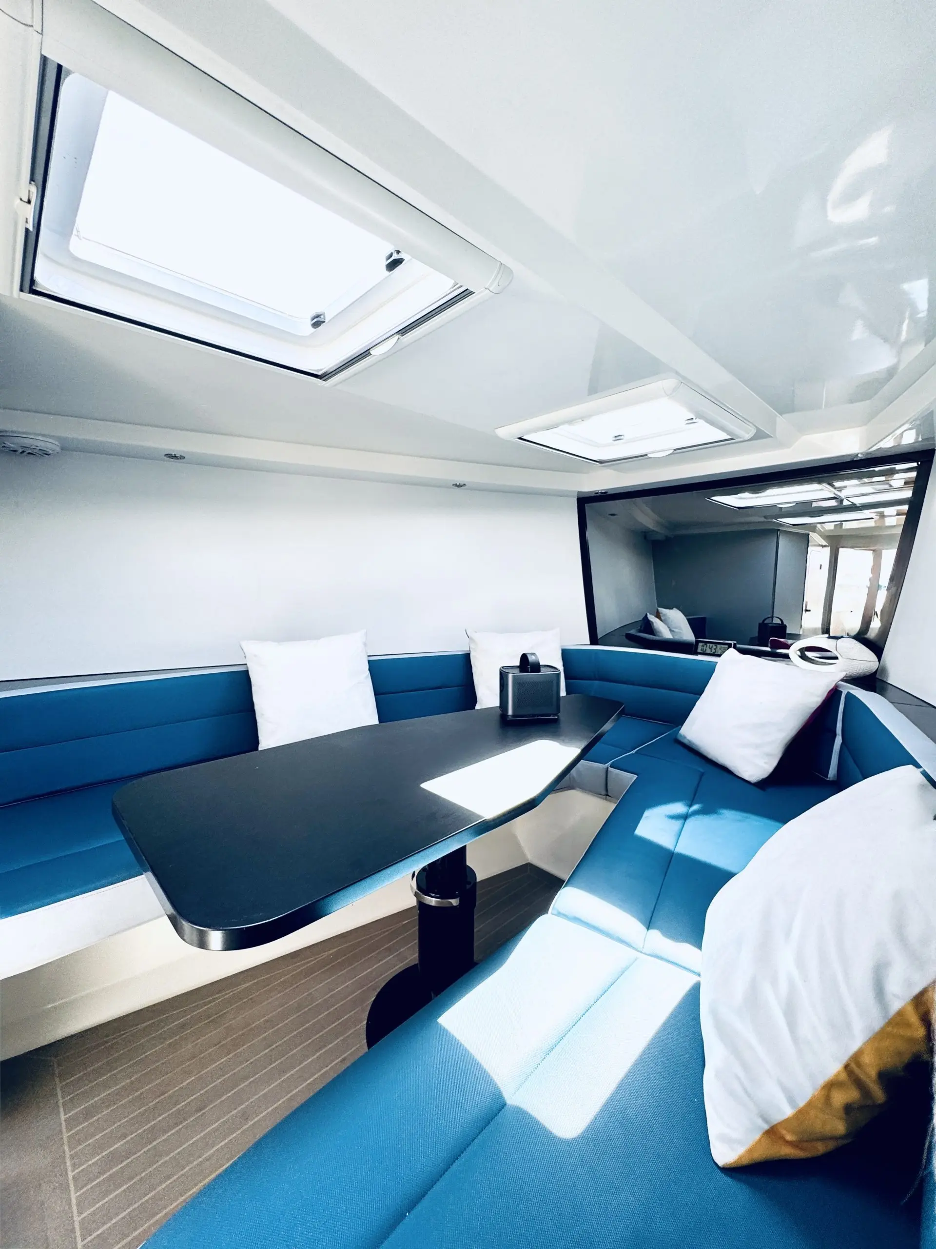 Von Dutch 40 cabin seating area with skylight window