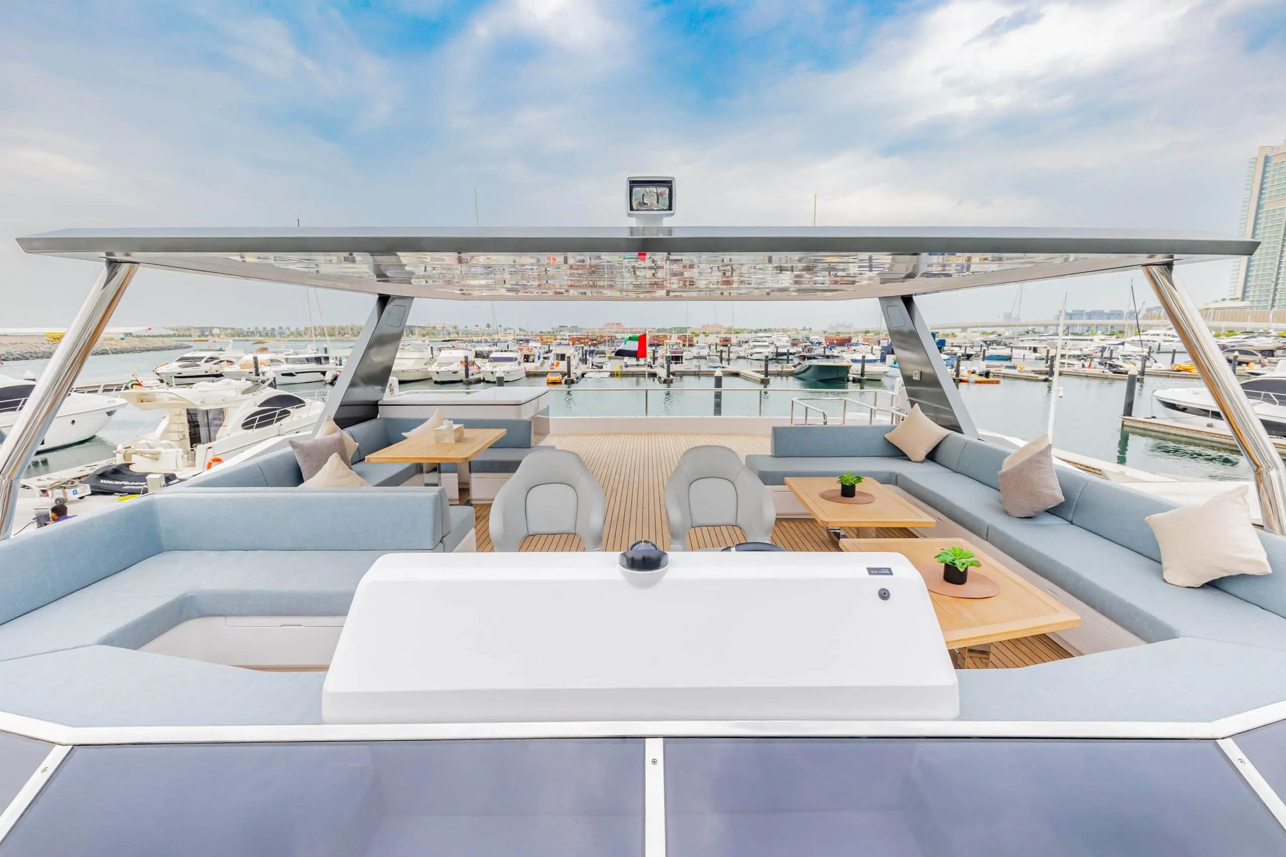Front sunbed area of the Zirve 72 yacht with scenic water and sky views