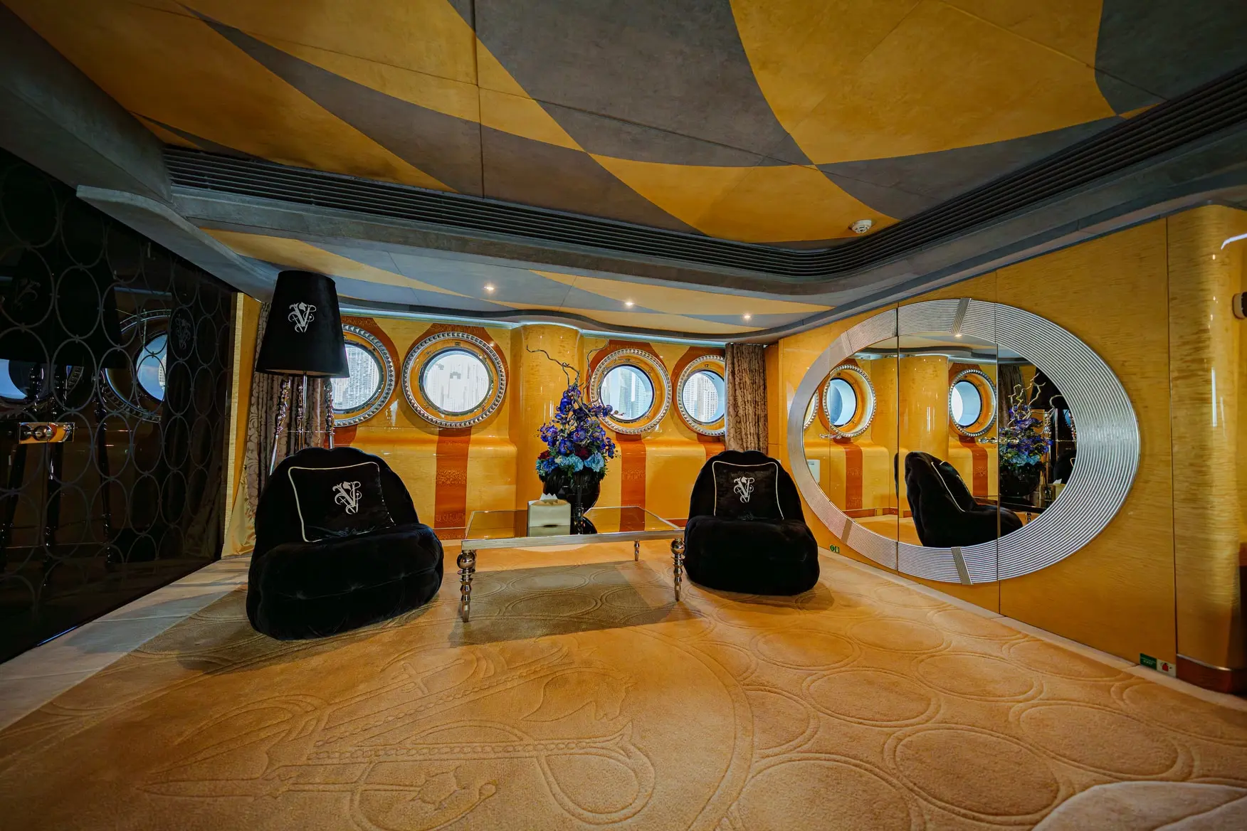 Thunder Superyacht indoor activity space with premium lighting and wooden flooring