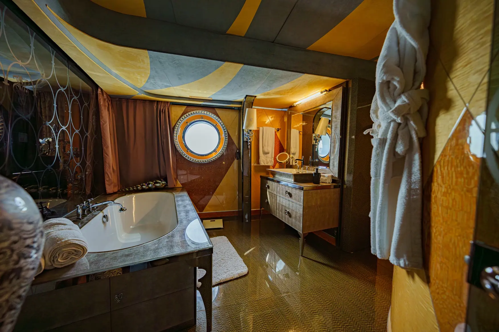 Thunder Superyacht luxury hallway leading to private cabins with wooden finishes