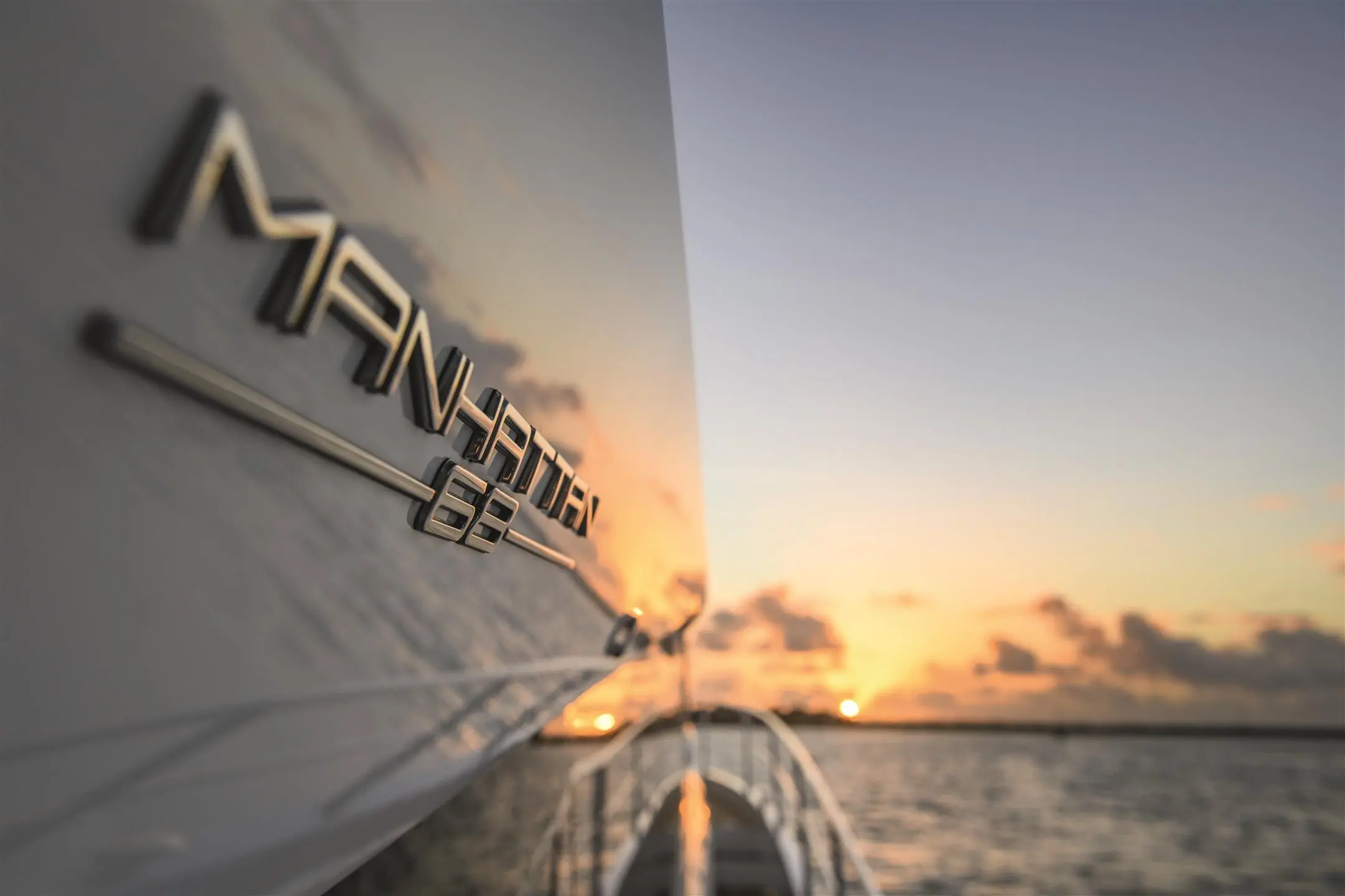 Sunseeker Manhattan 68 model badge at sunset — shipyard photo