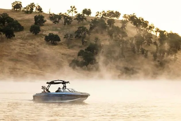 Supreme S240 on misty morning water, profile view — press photo