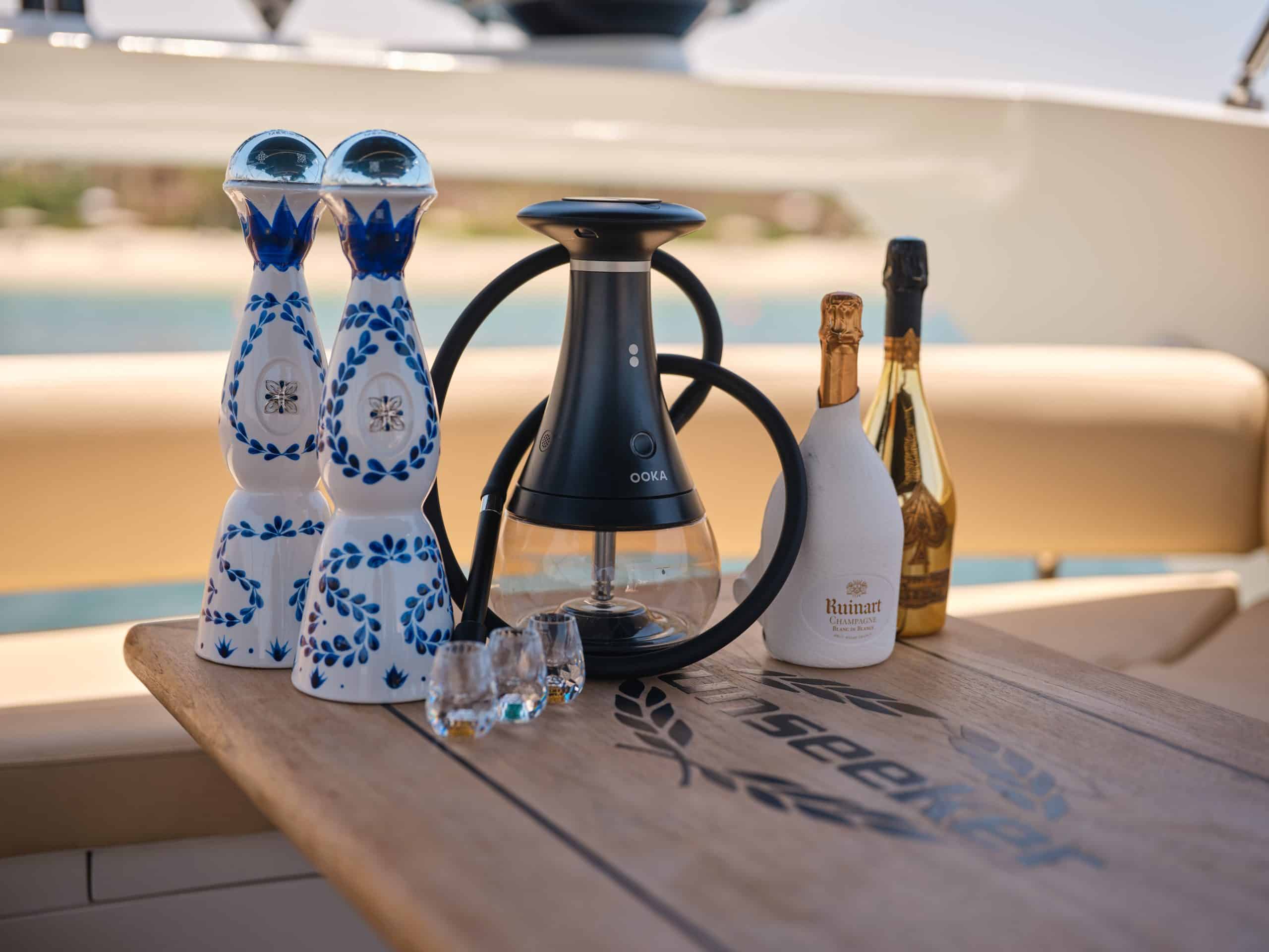 Refreshment bar setup with coffee and drinks inside luxury charter yacht