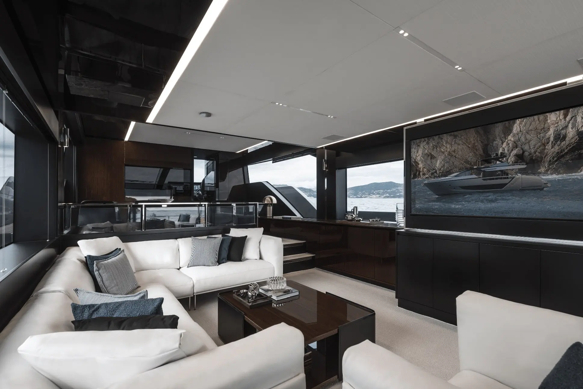 Riva 82 Diva saloon lounge with widescreen TV and coffee tables