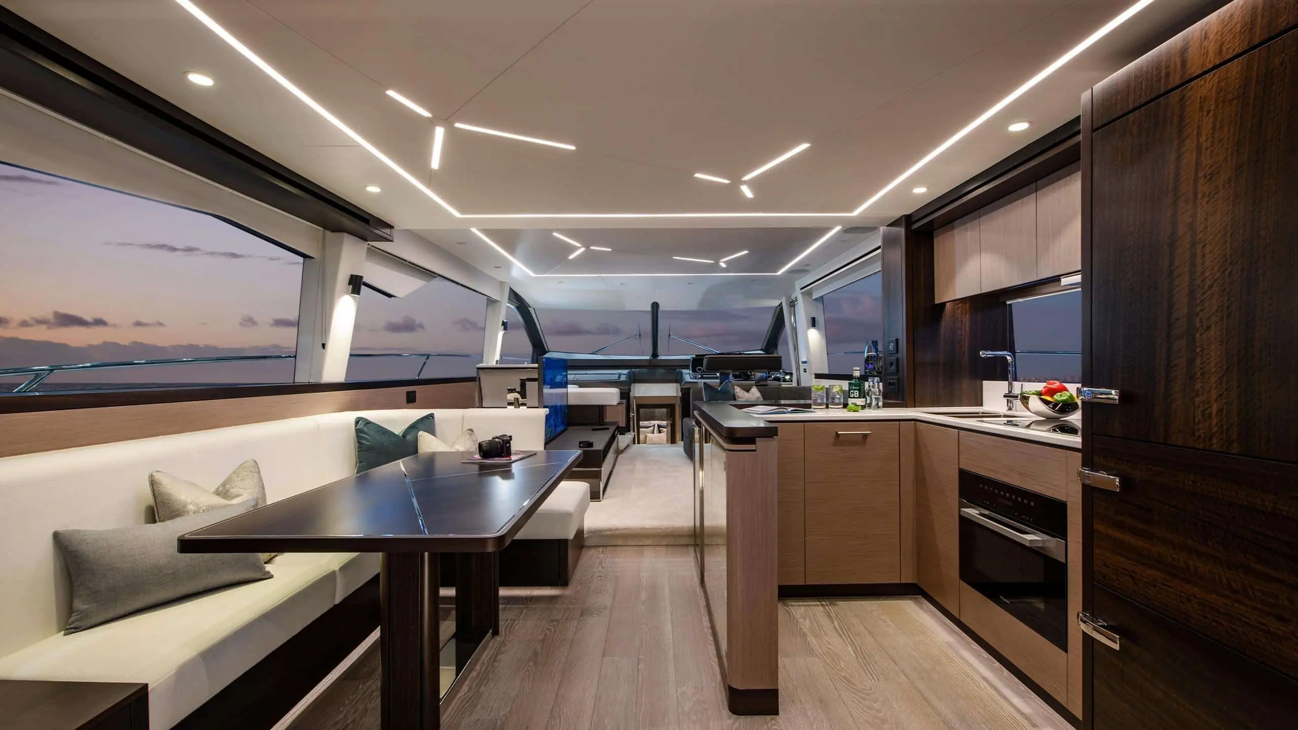 Sunseeker Manhattan 68 main saloon with aft galley — shipyard photo