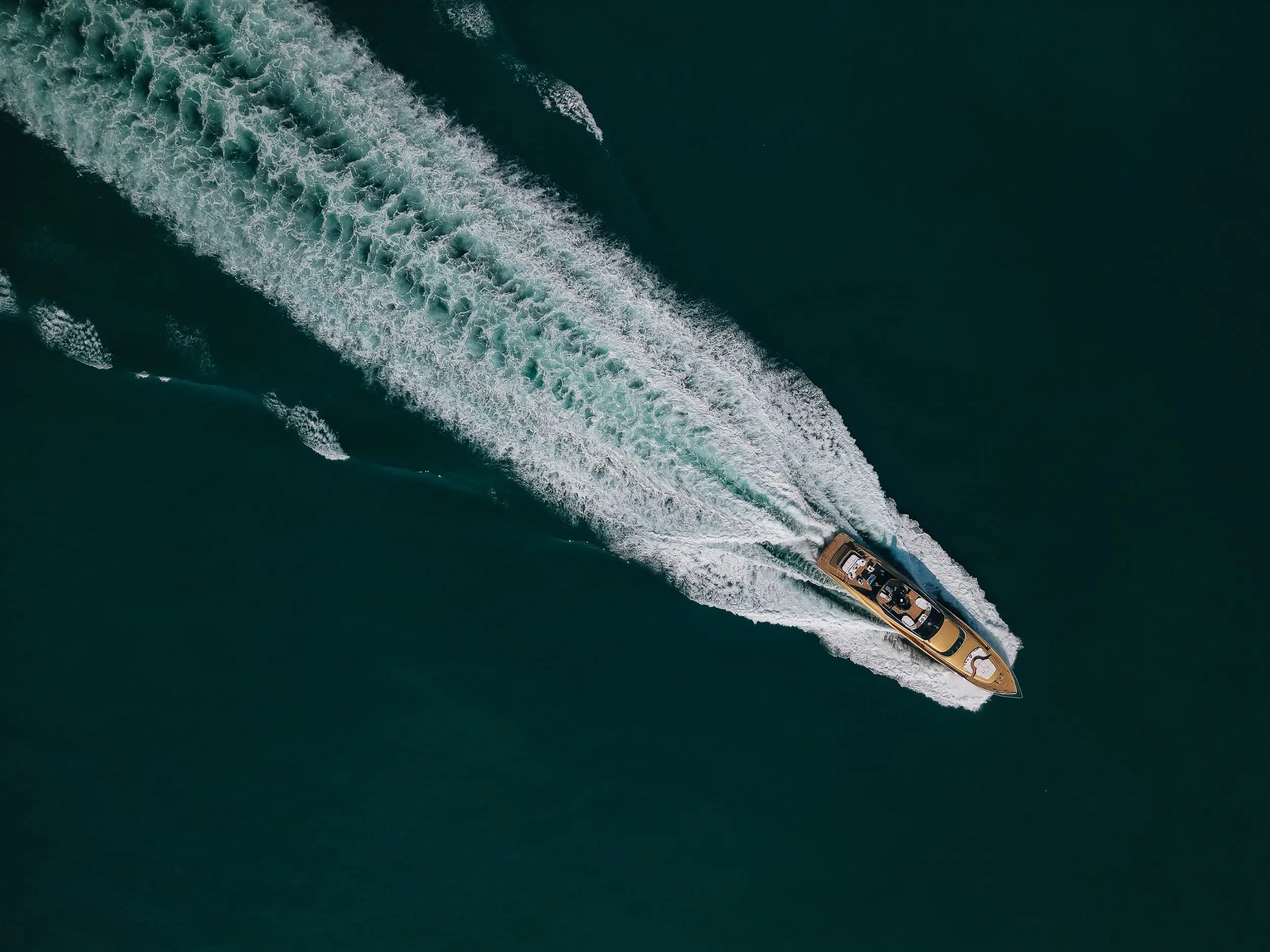 Aerial view of Royalty 136 luxury yacht cruising at sea