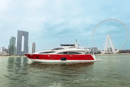 Asya 110 red hull yacht sailing in Dubai waters