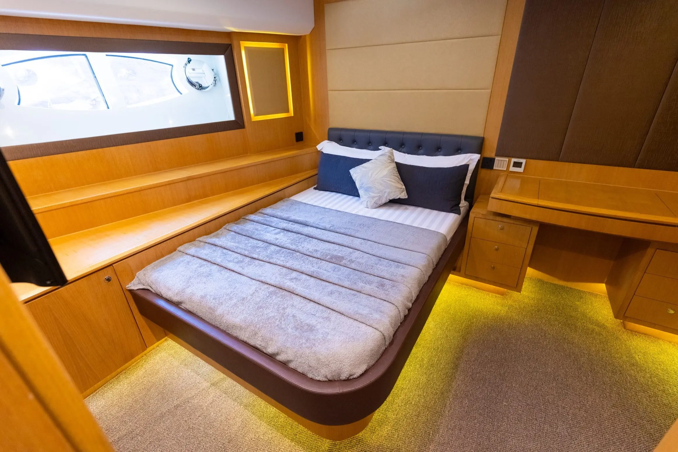 Asya 110 yacht master cabin with queen size bed and ambient lighting