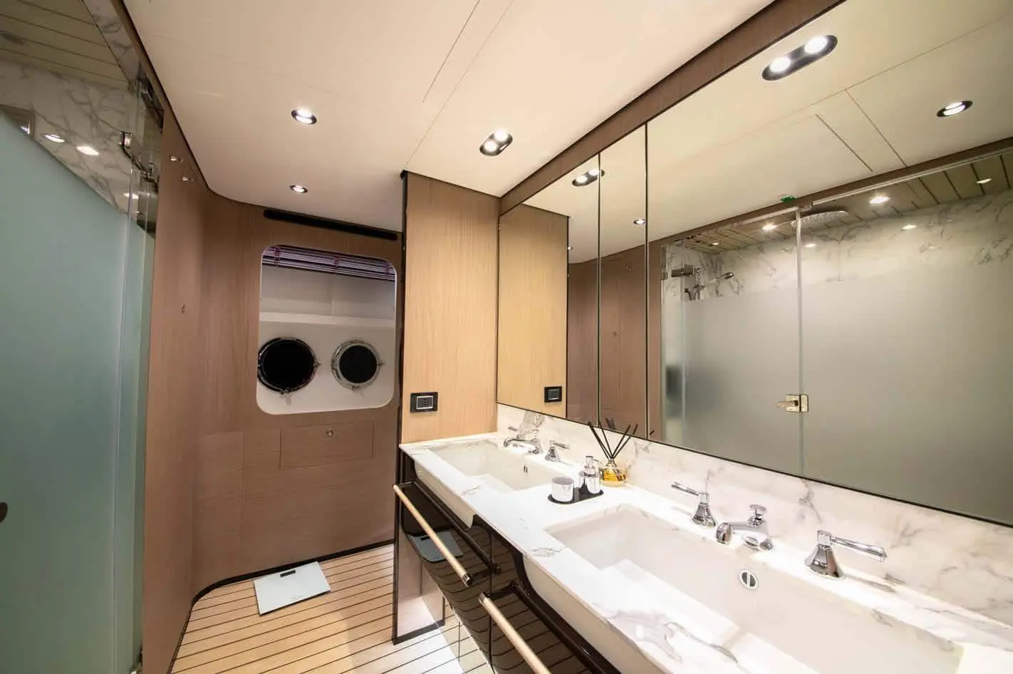 Azimut Grande 27M owner's bathroom with double vanity, broker photo