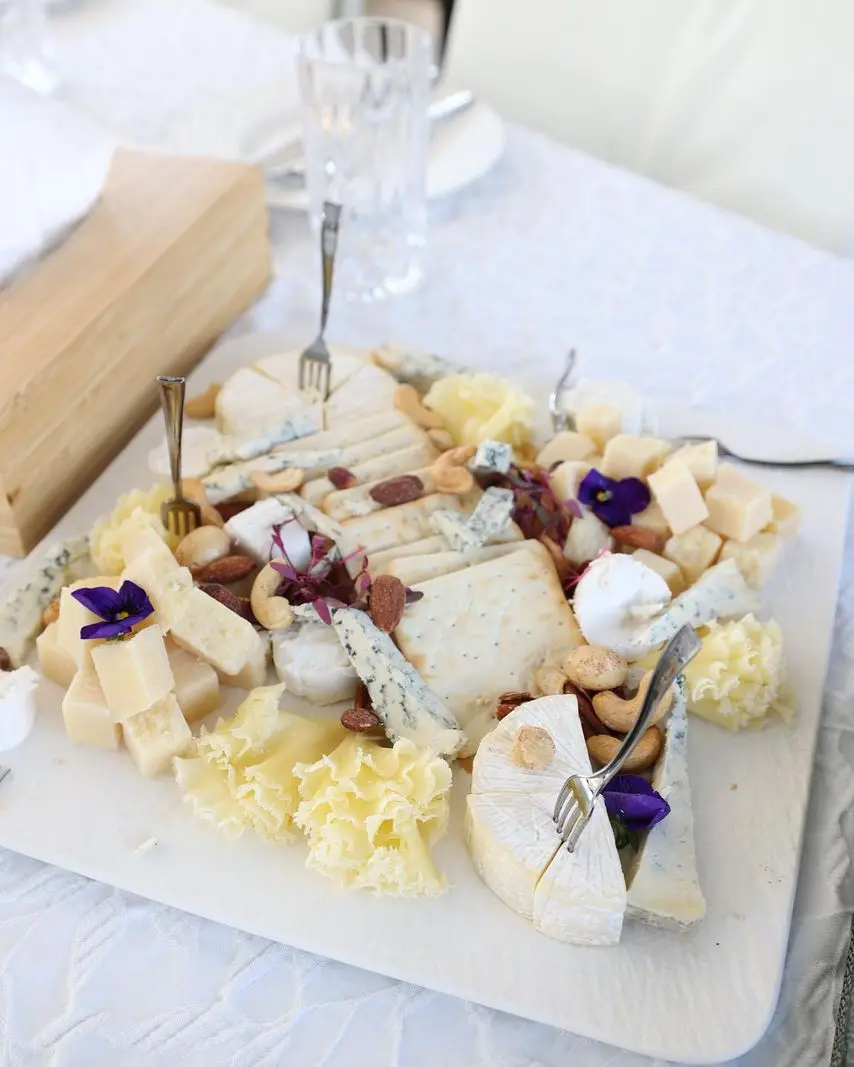 gourmet cheese platter with decorative presentation for yacht catering