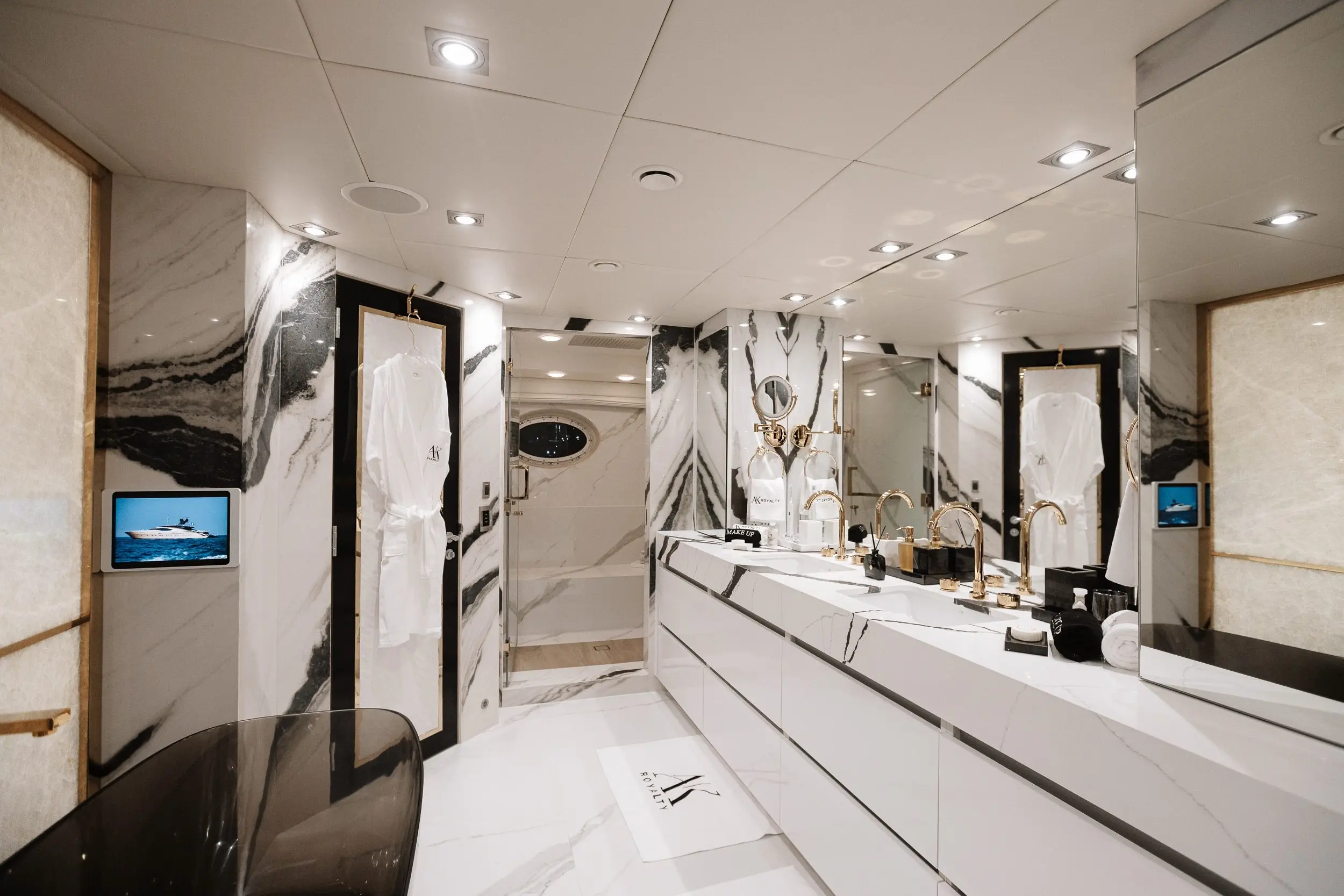 Royalty 136 yacht luxury bathroom with marble finishes and modern vanity design