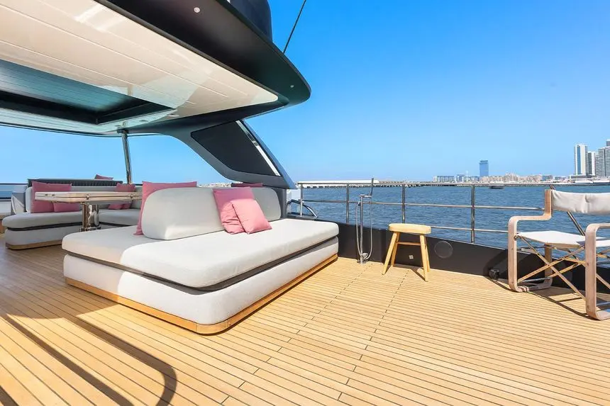 Cranchi Settantotto 78 flybridge aft lounge with daybed and stools