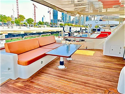 Benetti 120 outdoor lounge seating area with modern furniture and wooden deck