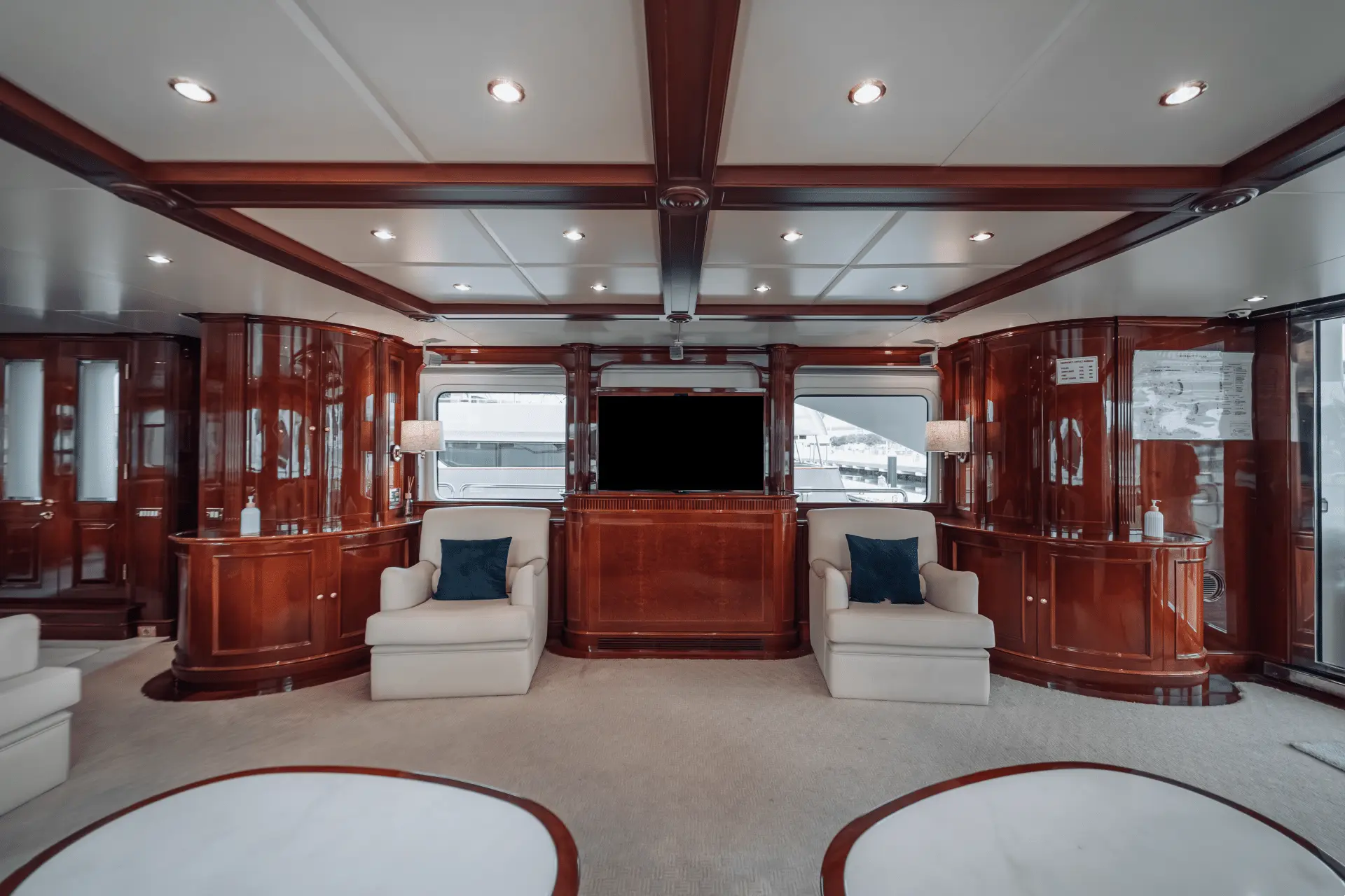 Royal Mirage yacht interior lounge with wooden finishes