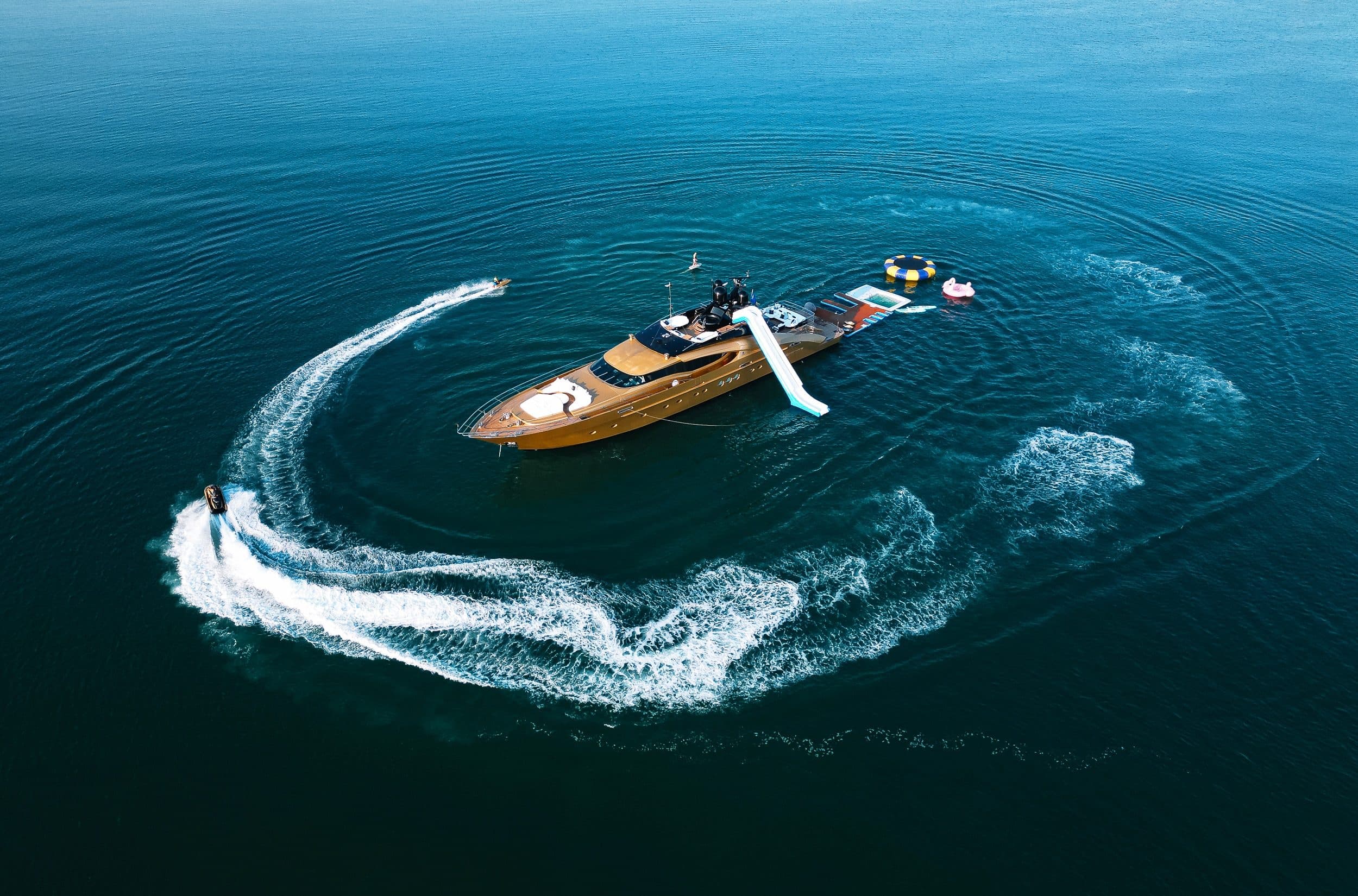 Royalty 136 luxury yacht making a turn in open ocean
