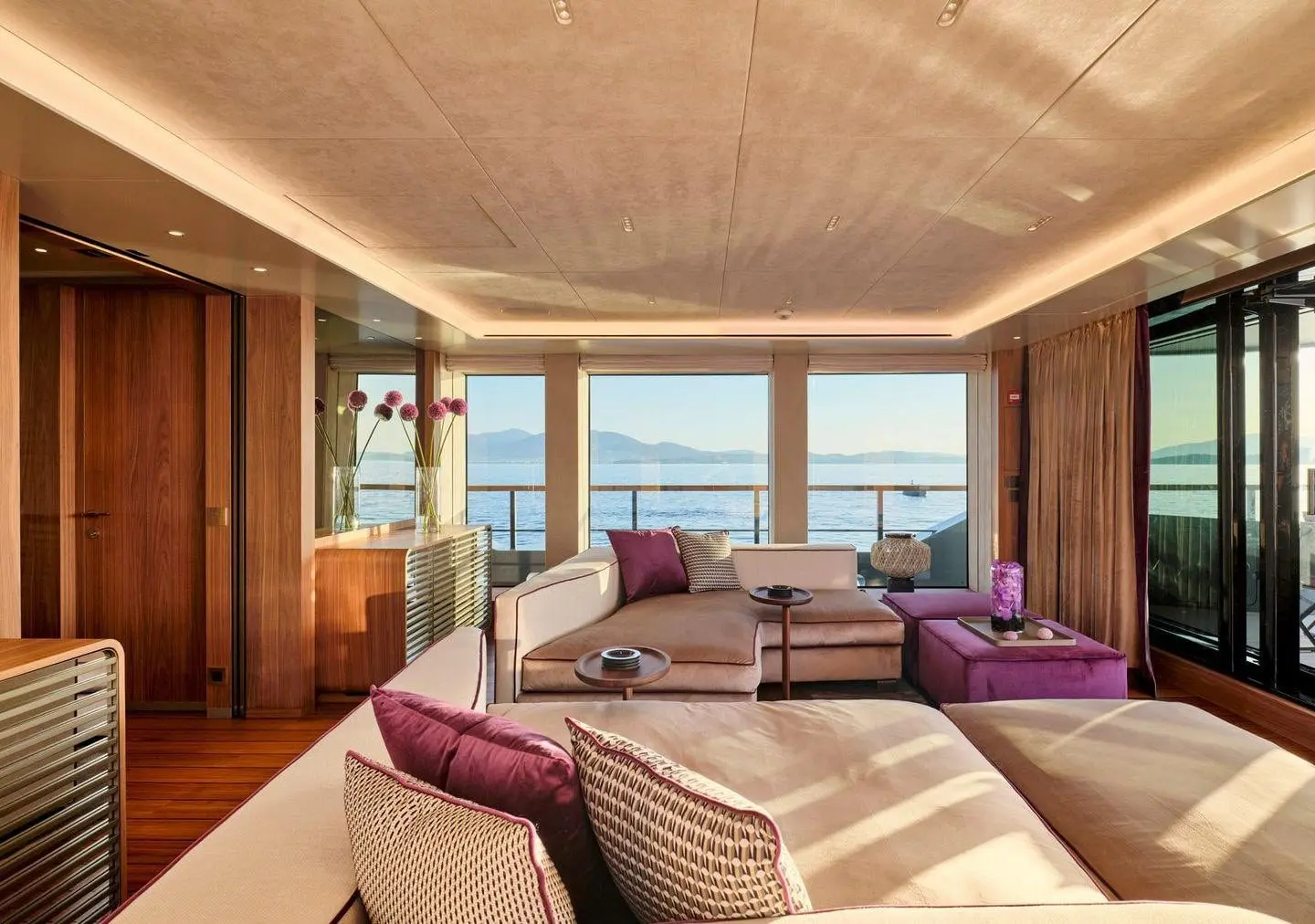 Sanlorenzo 500EXP main salon lounge with panoramic windows, broker photo