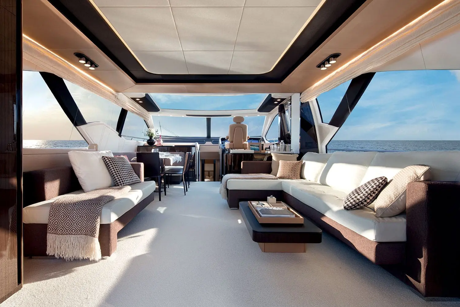 Azimut 77S main saloon with sofas under hard top — shipyard photo