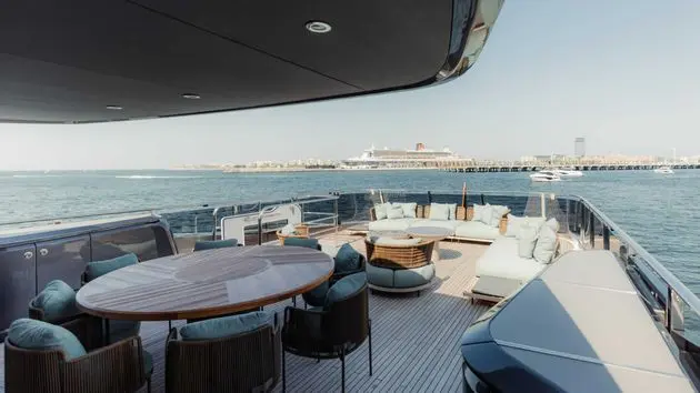 Princess X95 flybridge dining and lounge area