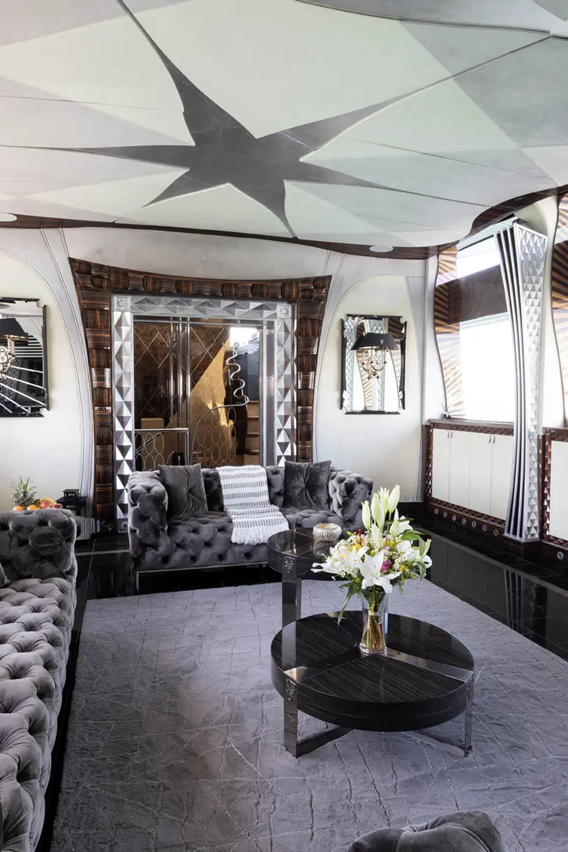 Thunder Superyacht luxury guest cabin with elegant decor and plush bedding