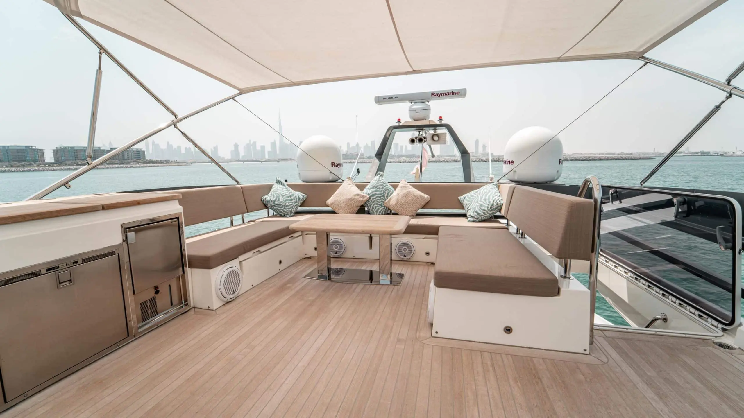 Flybridge dining and seating area on Dolce Vita luxury yacht