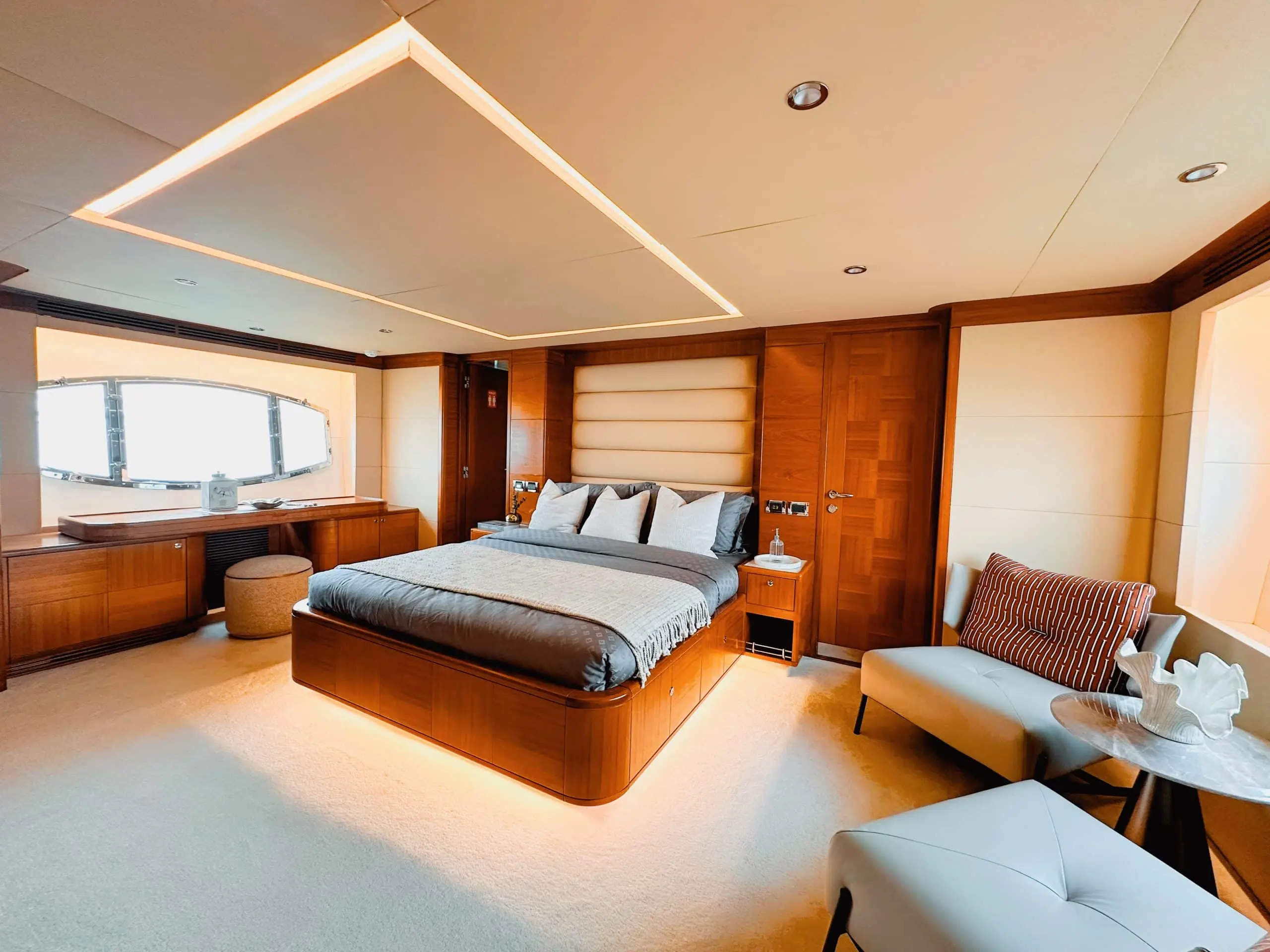 Luxury master cabin interior on Luna 101 yacht with modern design and marina views