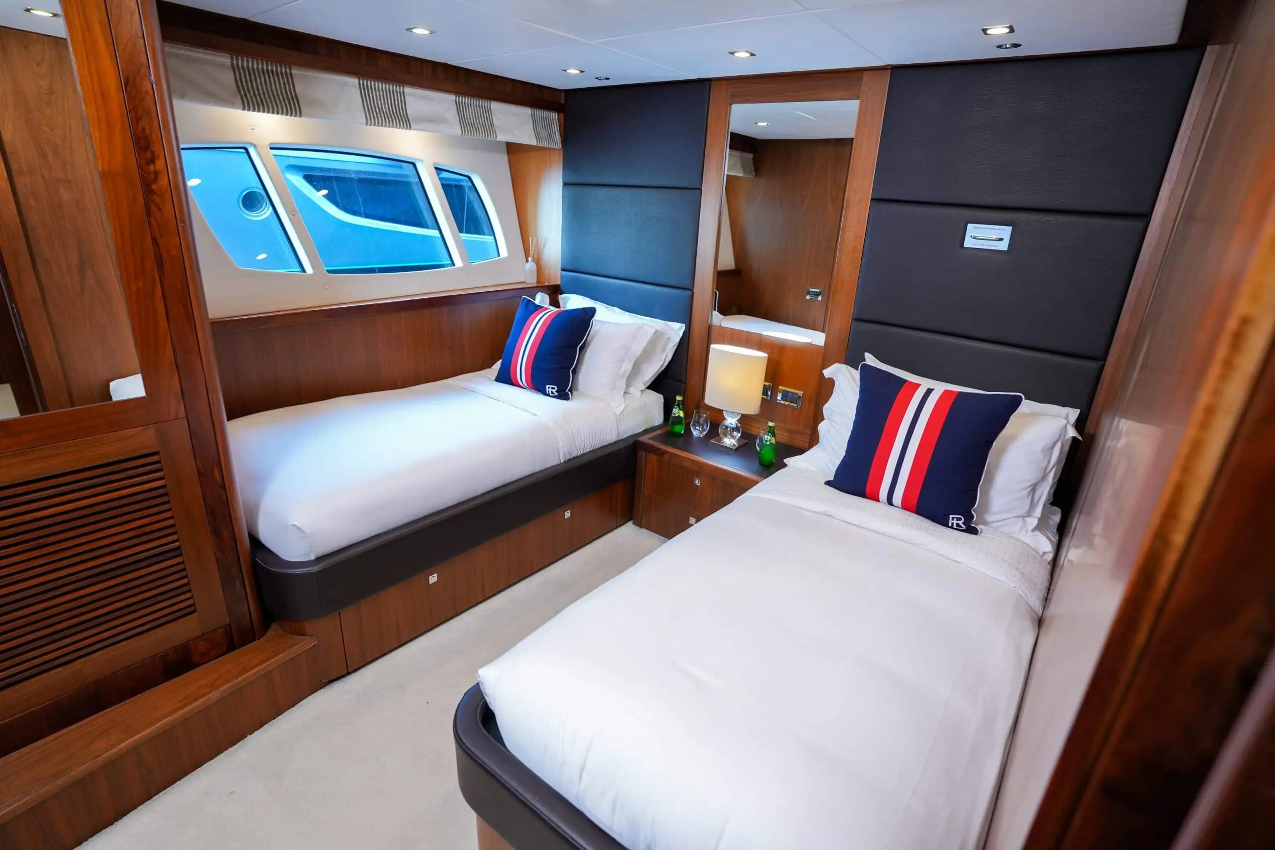 Twin bed cabin bedroom on Sunseeker 131 yacht
