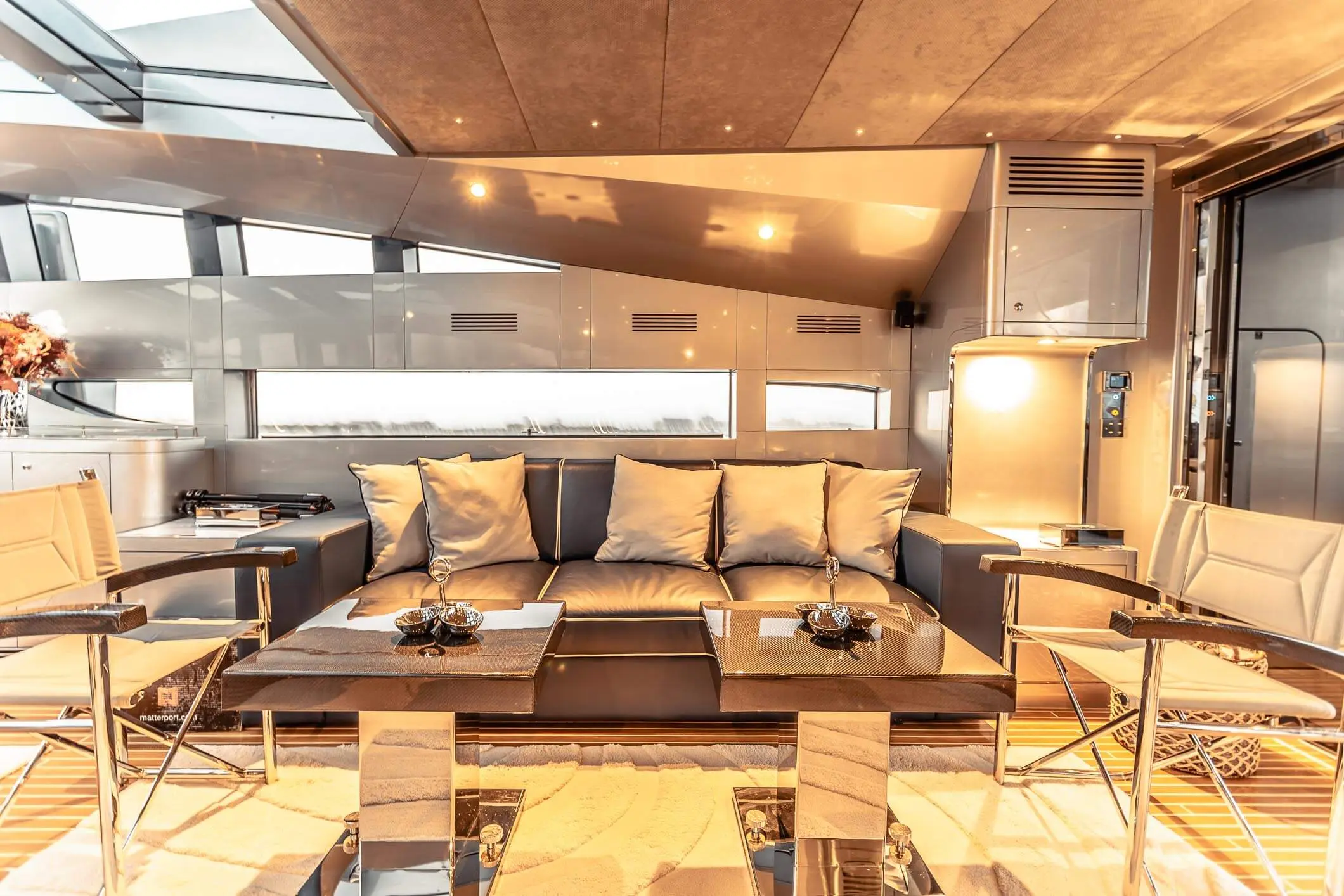 Baglietto 105 HT saloon seating with coffee tables and lamps
