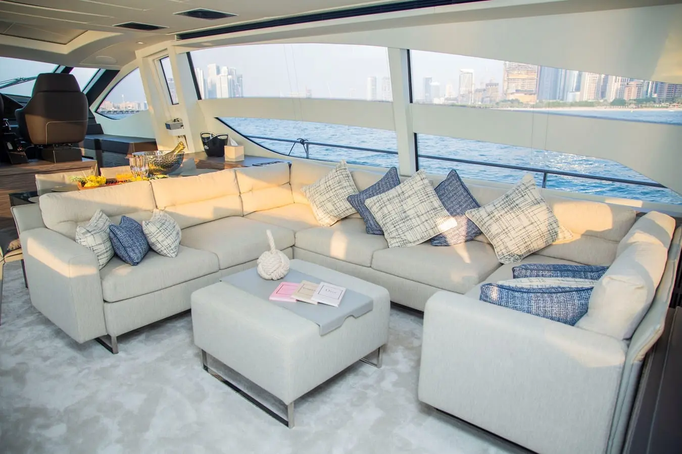 Pershing 82 main saloon lounge with panoramic side windows