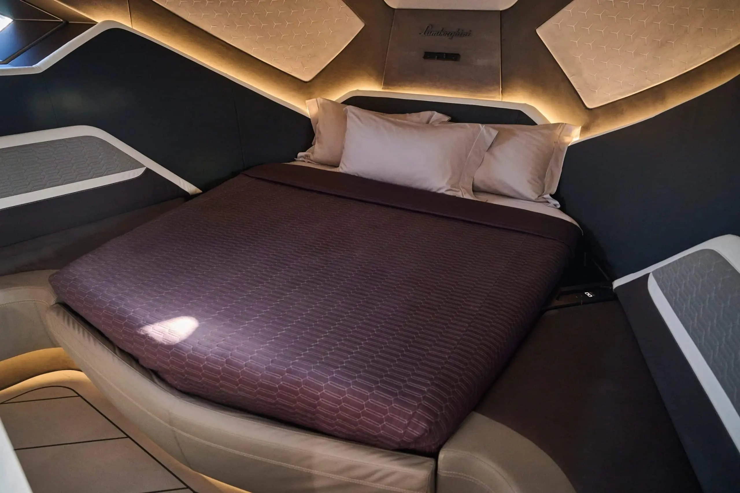 Lamborghini 63 yacht luxury cabin bed with premium bedding and sculpted interior design