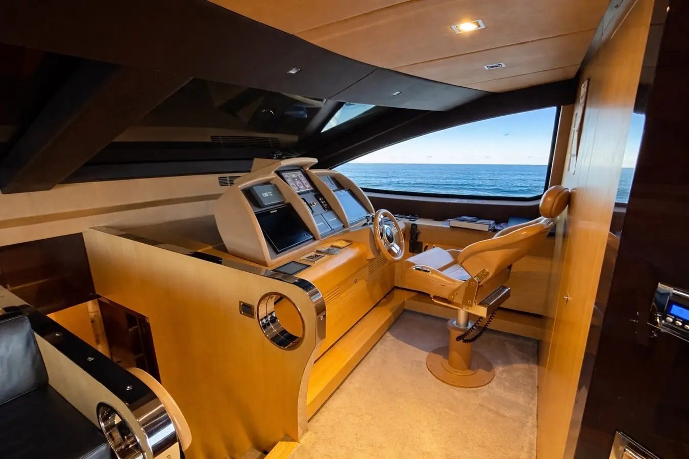 Azimut 88 lower helm station with triple navigation displays