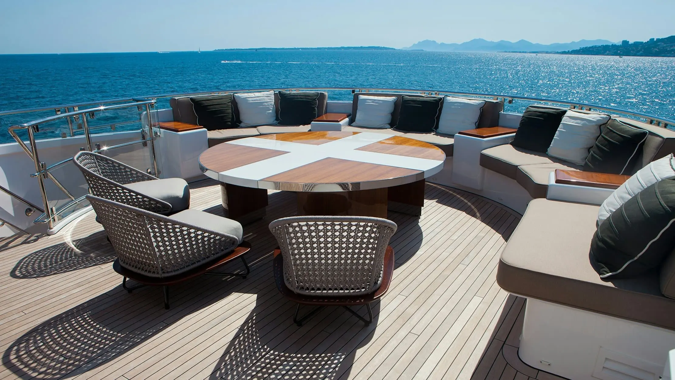 Circular sunbed seating area on Sofiya 153 yacht deck