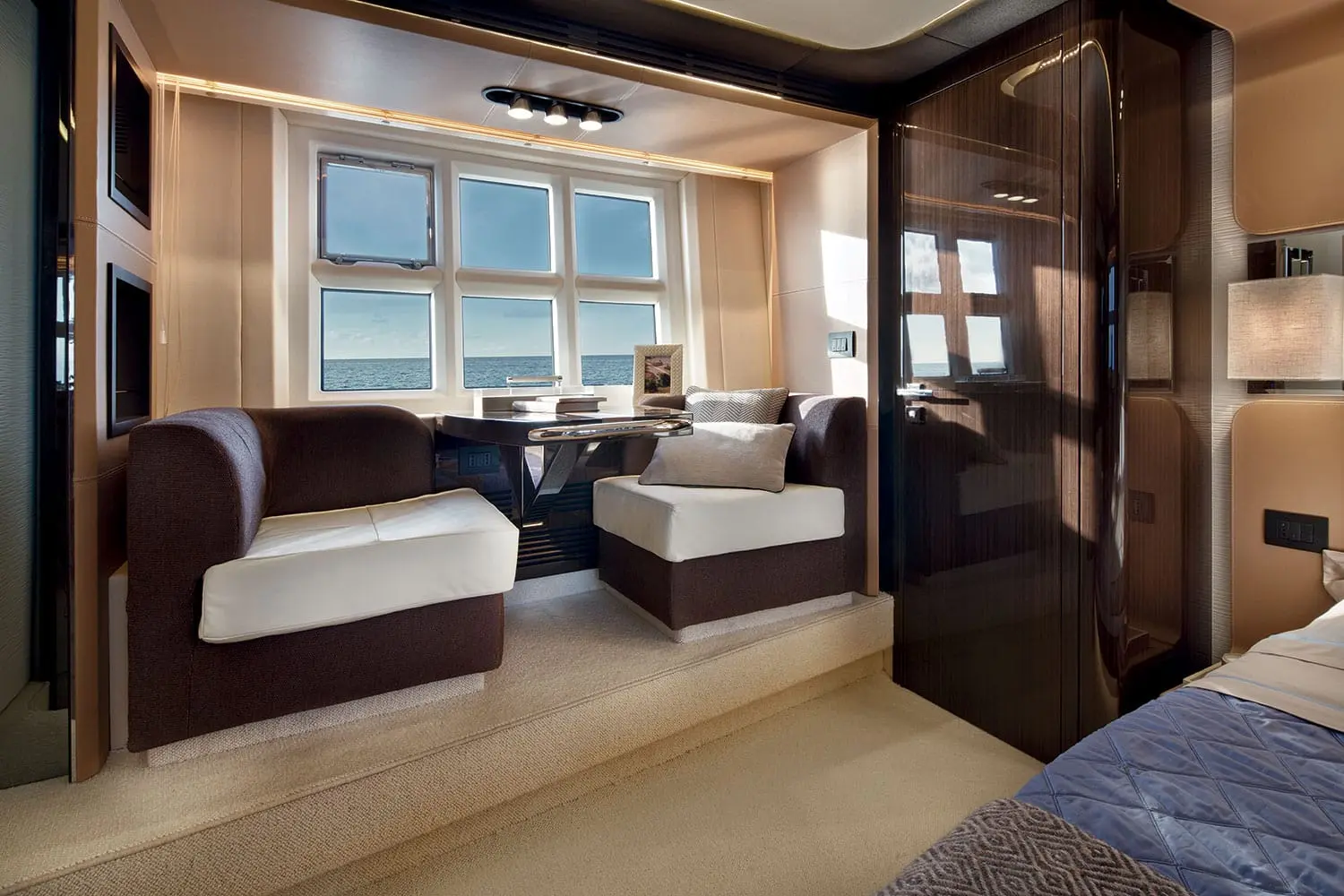 Azimut 77S owner cabin lounge with hull windows — shipyard photo
