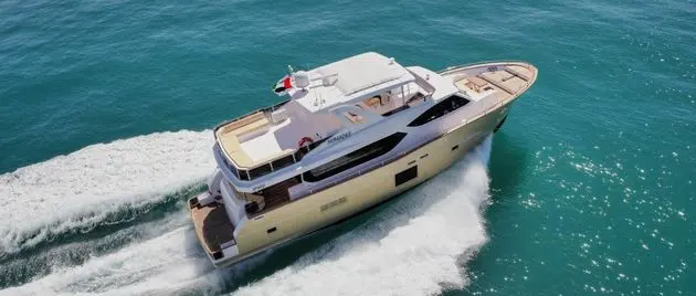 Nomad 65 aerial bow view at anchor offshore — shipyard photo