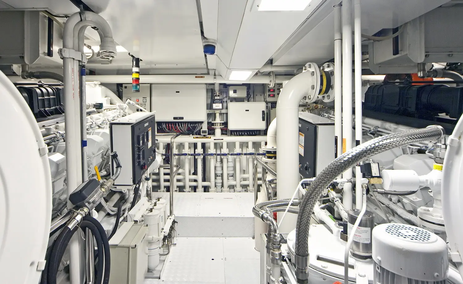 Athena 170 yacht engine room with twin diesel engines and technical equipment