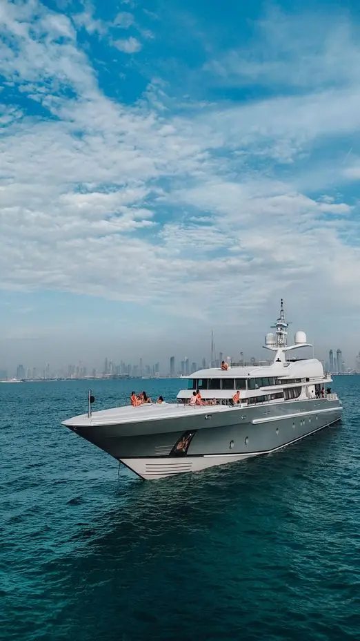 Thunder Superyacht exterior cruising in Dubai waters under clear sky