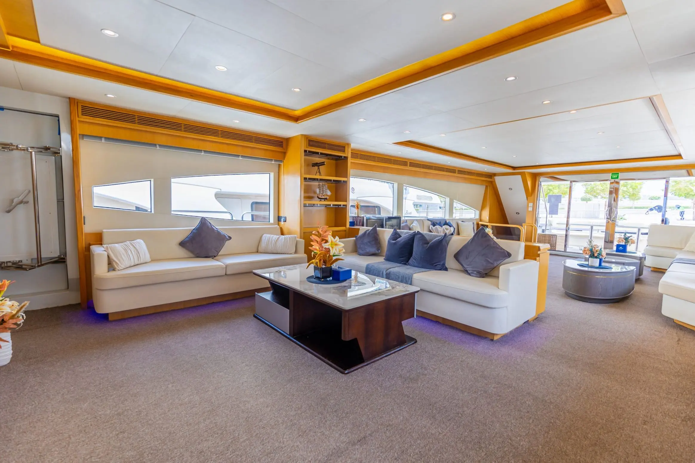 Asya 110 yacht spacious salon with modern décor and wooden ceiling
