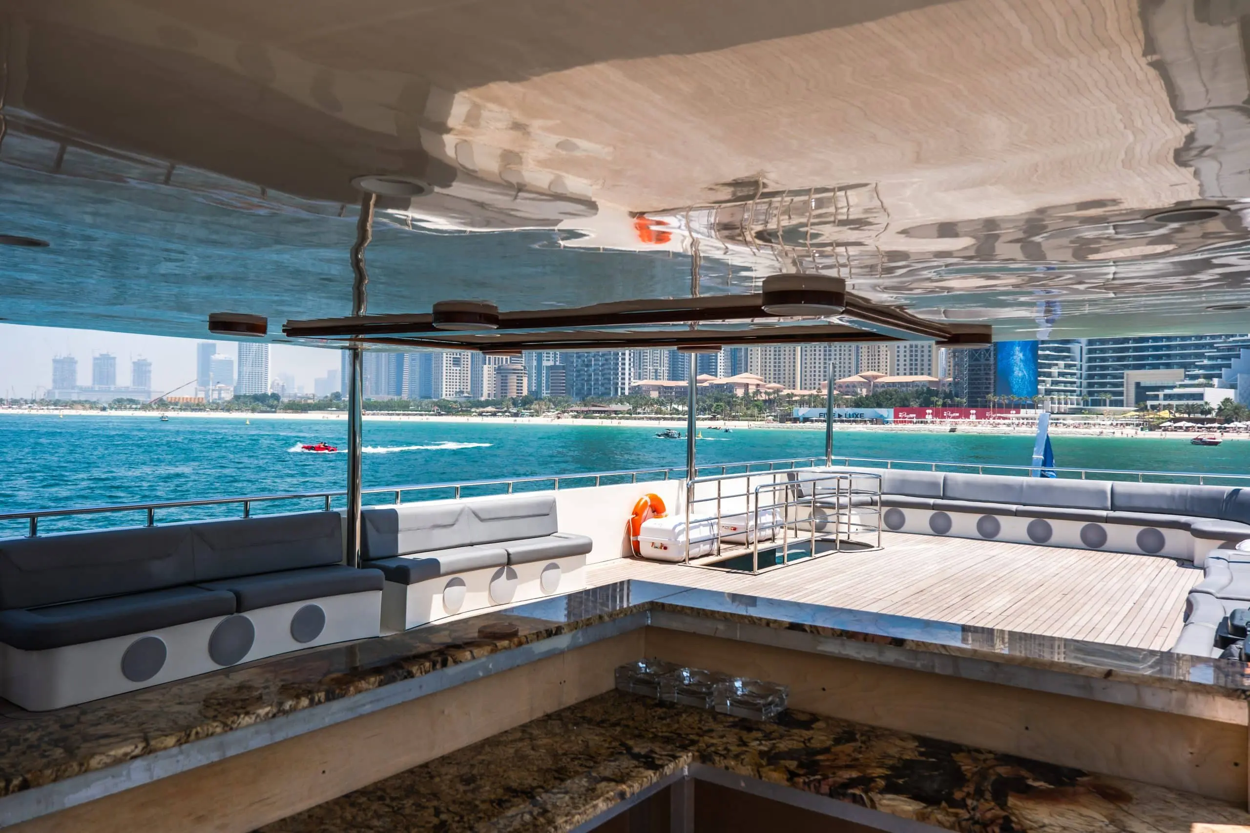 Luxury jacuzzi area aboard Sapphire 150 Yacht charter Dubai