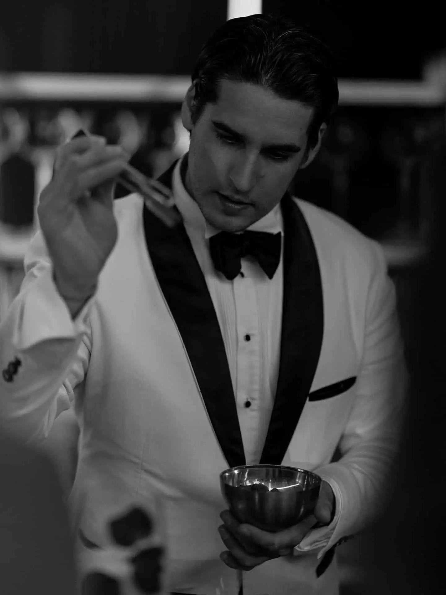 Professional bartender preparing cocktails at a luxury corporate yacht event