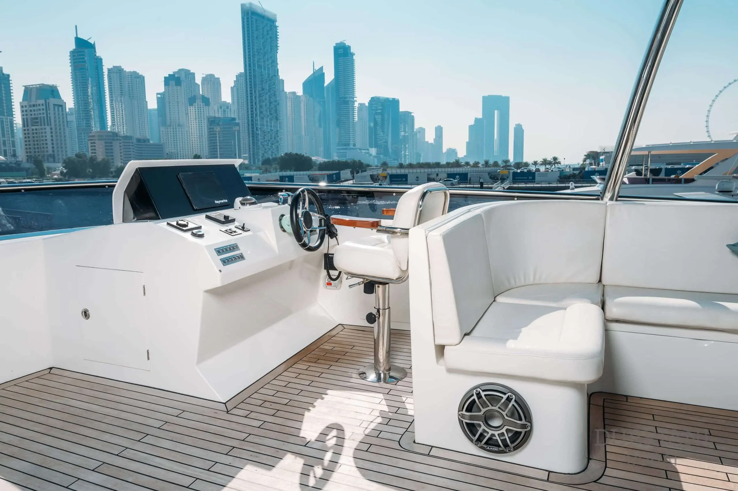 Eclipse yacht aft deck seating area with modern white lounge furniture