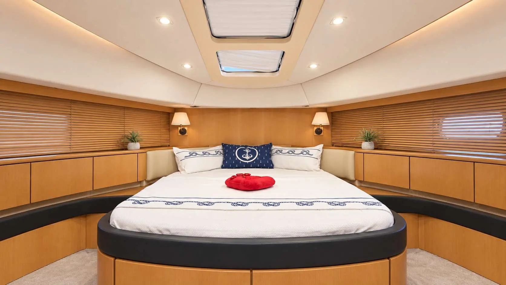 Empress 80 forward VIP cabin with double bed and skylights