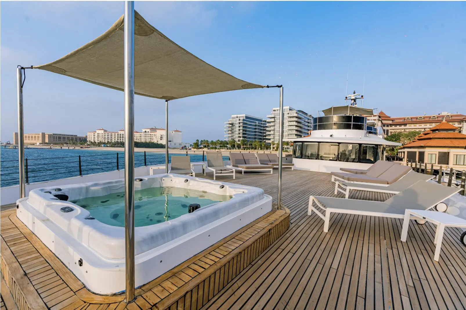 Luxury yacht jacuzzi and shaded seating area on Finesse yacht Dubai