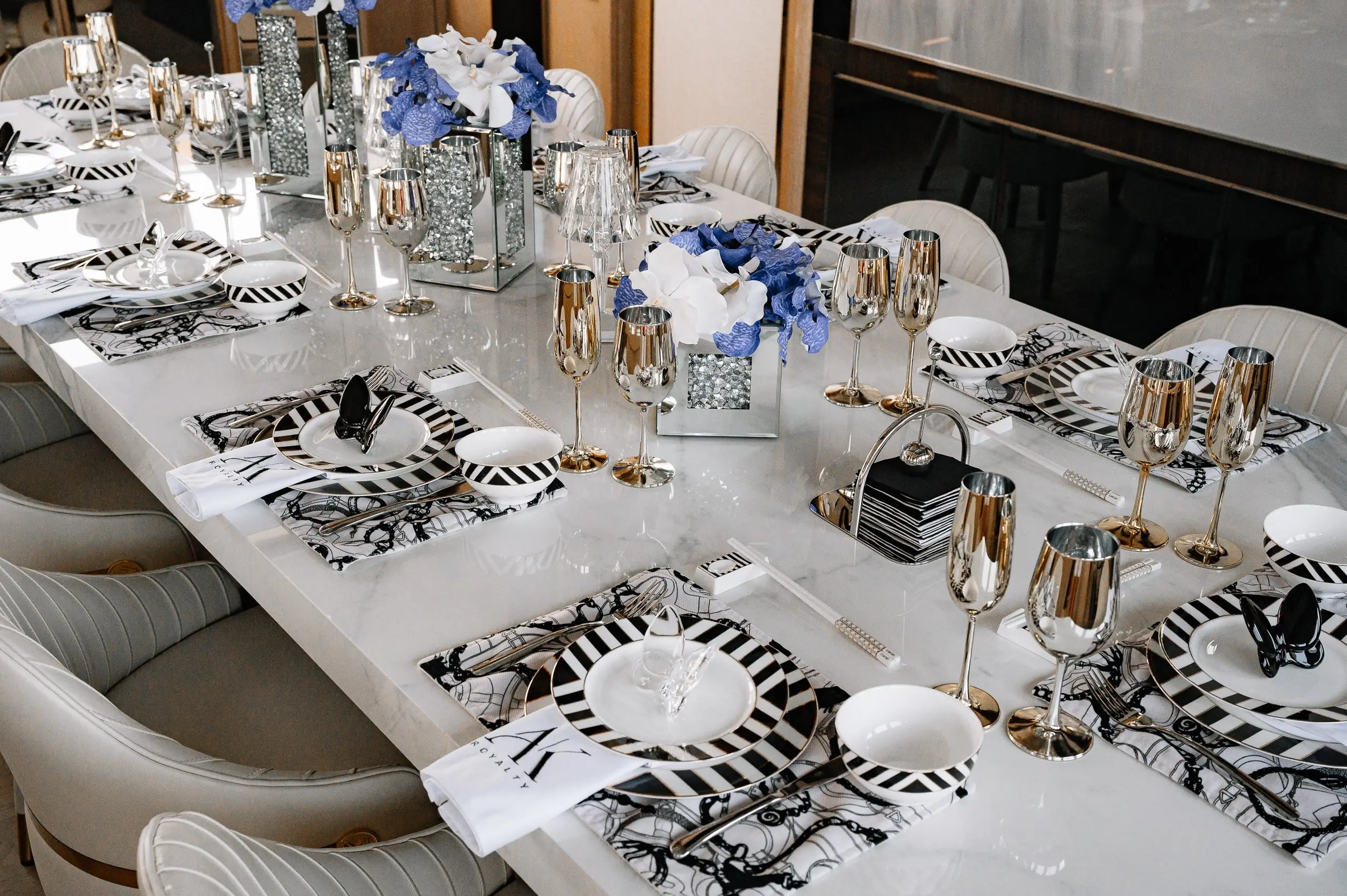 Royalty 136 yacht formal dining table setup with elegant décor and premium tableware