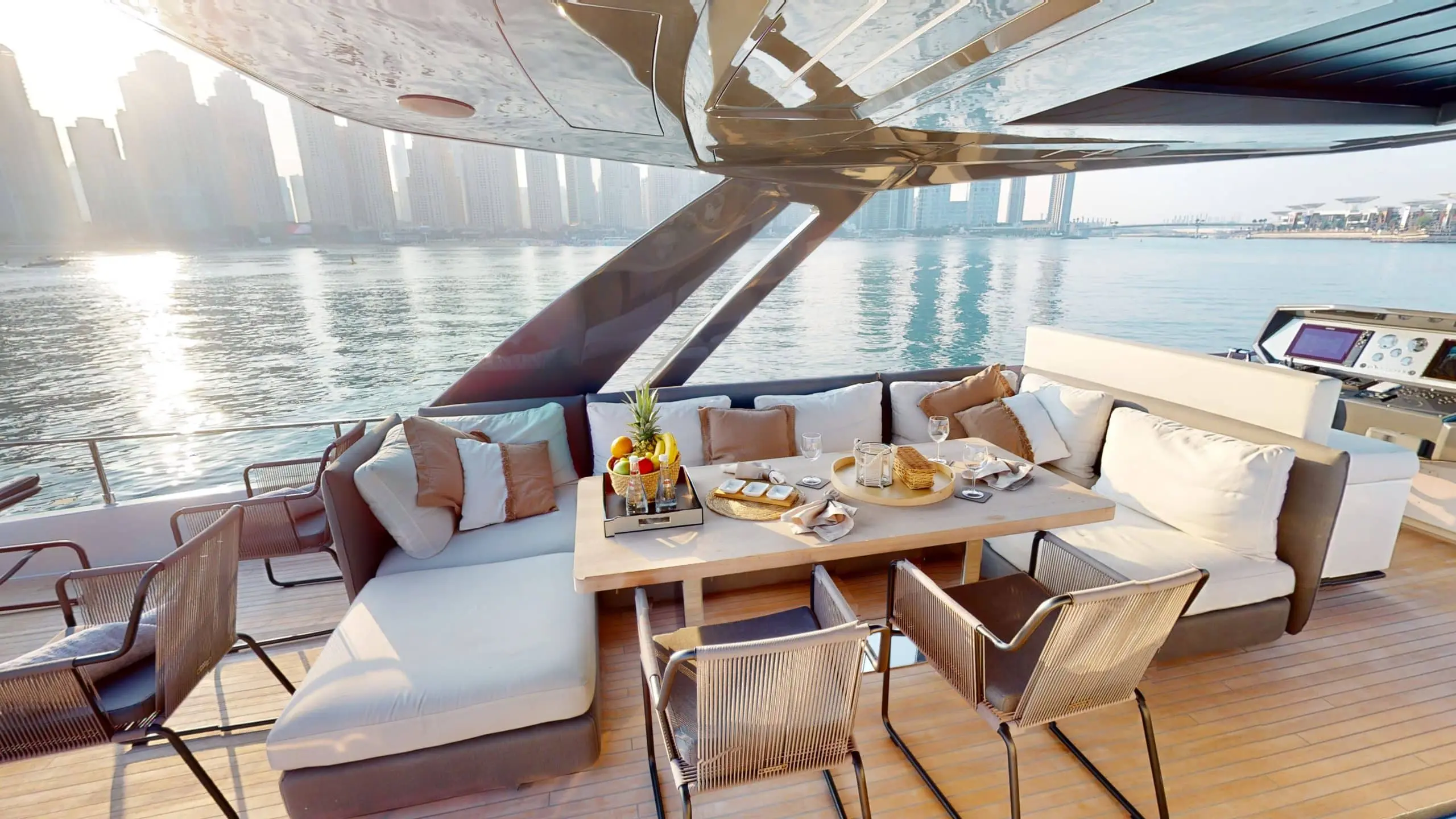 Ferretti 780 outdoor dining table setup with sea view