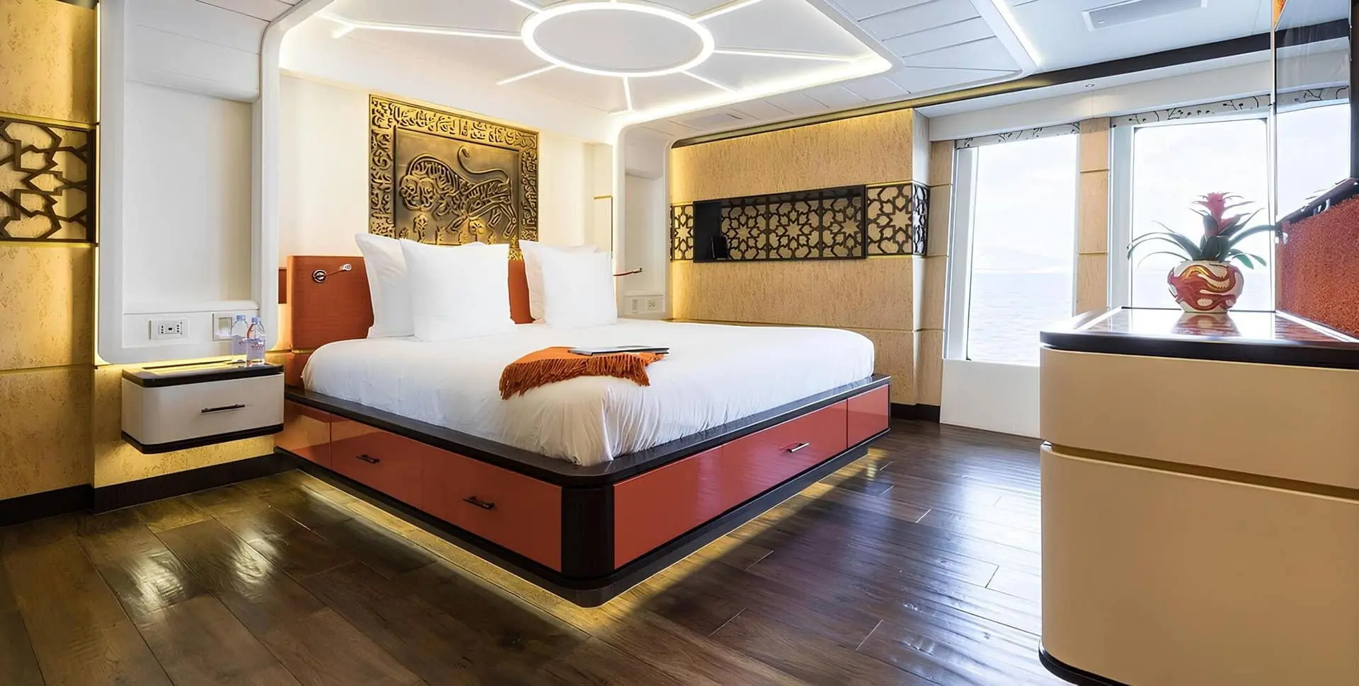 SuperSport 48 VIP cabin with double berth and warm orange accents