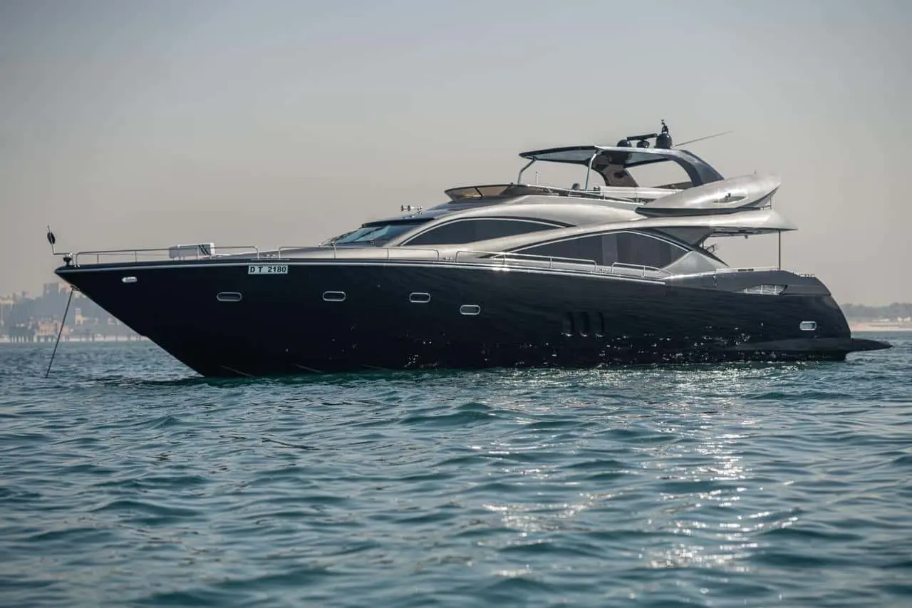 Sunseeker 82 Yacht profile at anchor, black hull after 2025 repaint