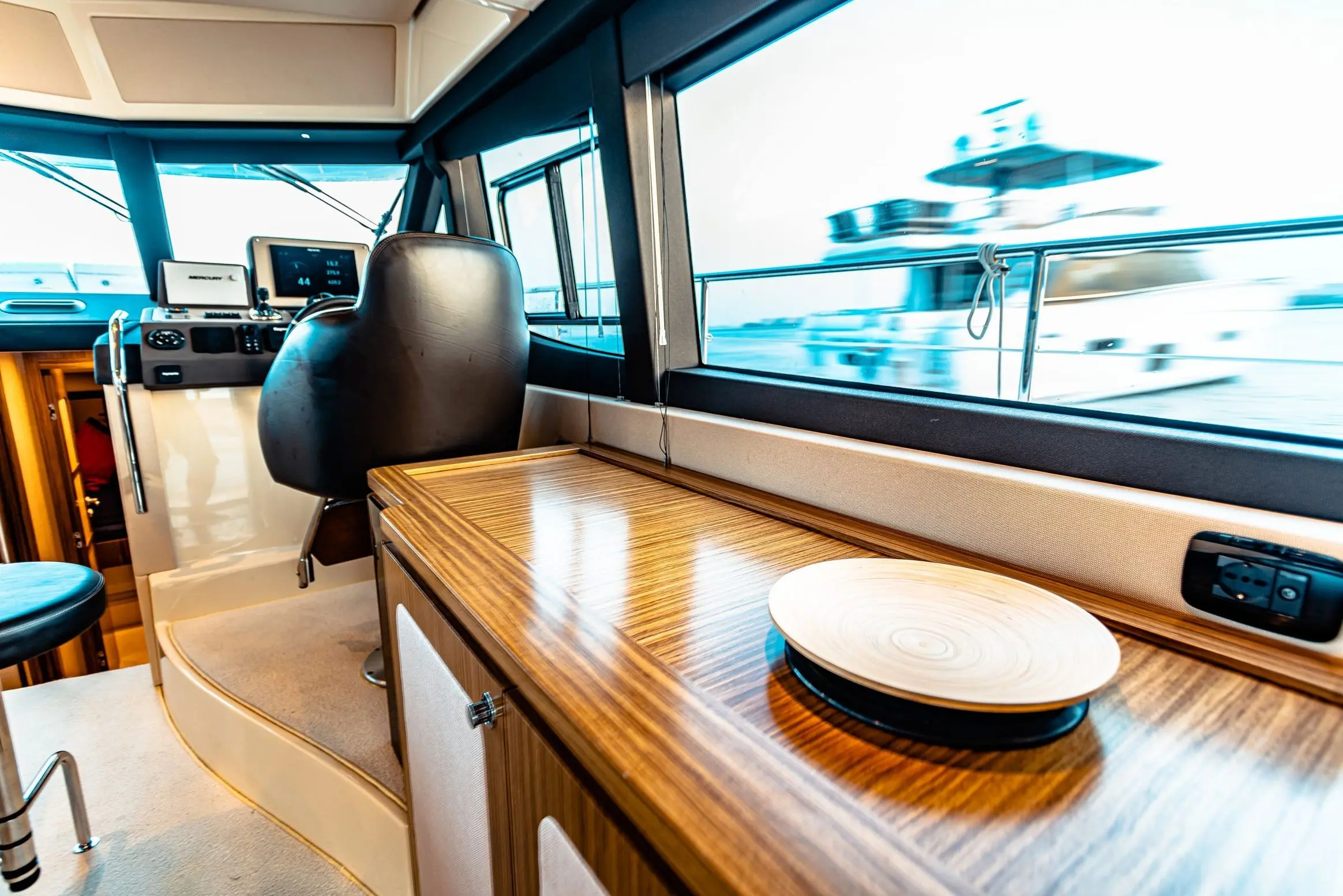 Azimut 50 Migueria yacht interior dining table setup