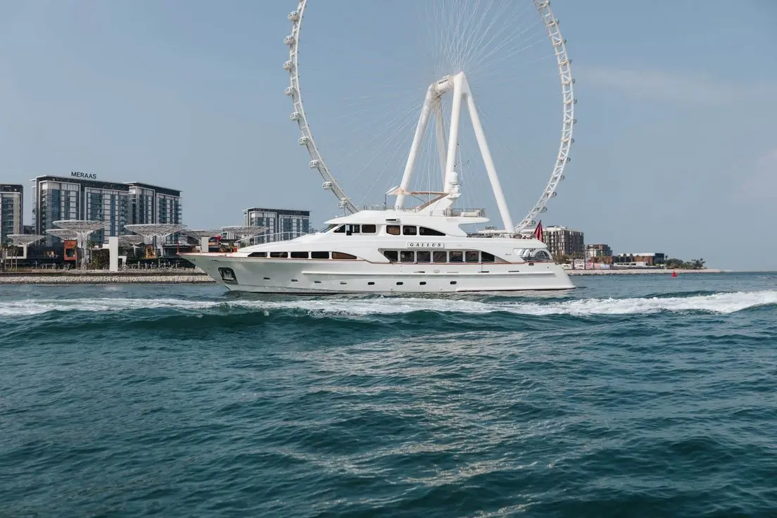 Luxury yacht cruising near Ain Dubai on the waters of Dubai.