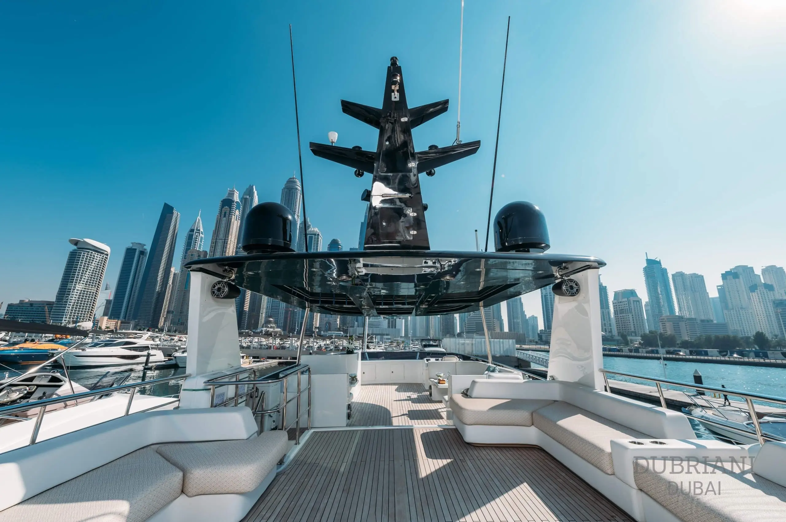 Eclipse yacht observation deck with lounge seating and elevated sea views